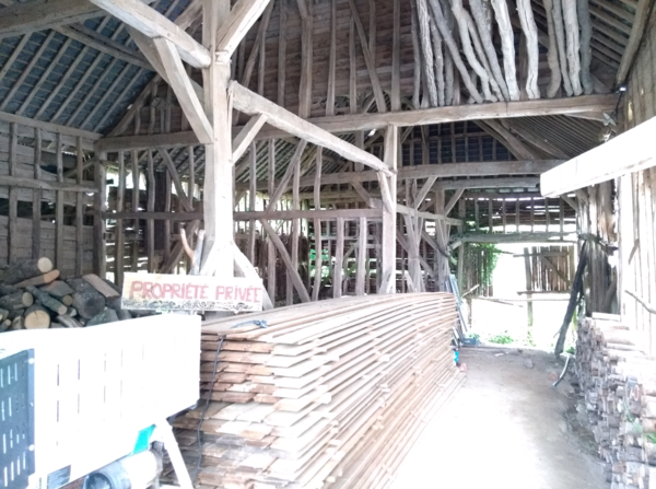 Lot's of wood in this old French barn...